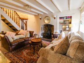 A living room with a sofa and fireplace at Dunning, The Mount in York