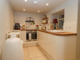 A kitchen with a sink and oven at Dunning, The Mount, York