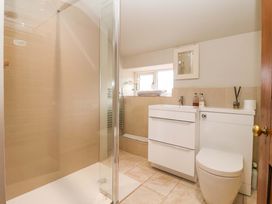 A bathroom with shower, sink, and toilet at Dunning, The Mount in York