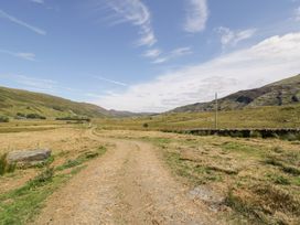 A path through fields and hills at Cwm in Capel Curig