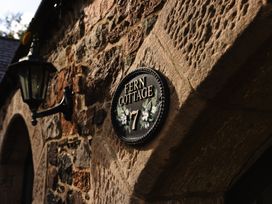 A sign for Fern Cottage at Akeld near Wooler
