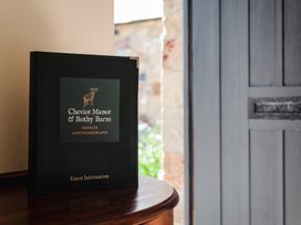 A guest information book on a table at Cheviot Manor in Wooler