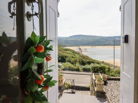 A view from the front door showing mountains and water at 5 Porkington Terrace in Barmouth