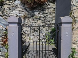 A gate and stone wall at 5 Porkington Terrace in Barmouth