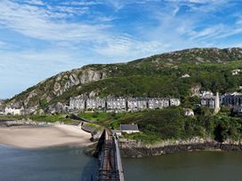 A view of houses along a coastal area at 5 Porkington Terrace Barmouth