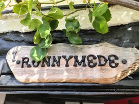 A sign with the name Runnymede at Runnymede in Tewkesbury