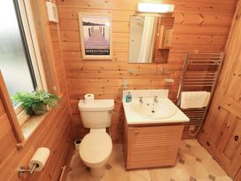 A bathroom with a sink and toilet at The Fold near Number 28, Burnside Park near Keswick