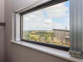 A window with a view of the countryside at The Cadeleigh Cadeleigh near Tiverton