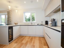 A kitchen with a countertop and sink at Chi Gwynn in Crantock