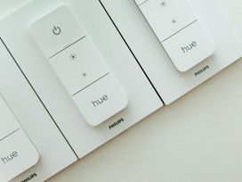Philips Hue light control switches on a wall at Ultramarine in Carbis Bay
