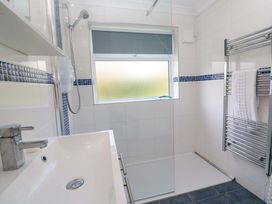 A bathroom with a sink and shower at Atlantic Waves in Carbis Bay