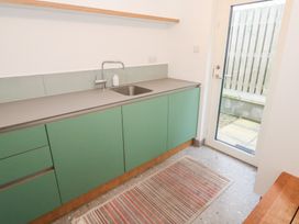 A kitchen with a sink and countertop at Bayside in Carbis Bay