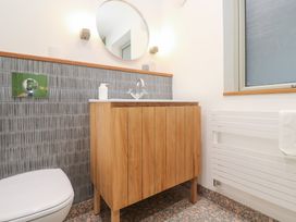 A bathroom with a sink and toilet at Bayside in Carbis Bay