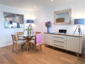 A dining room with a table and chairs at Sea Mist in Carbis Bay