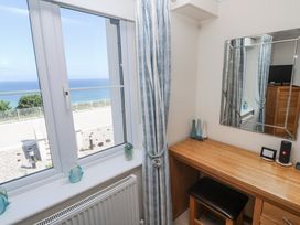 An office with a desk and window overlooking the sea at Golva in Carbis Bay