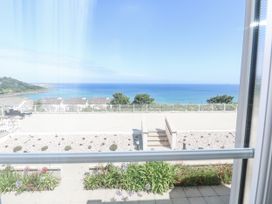 An outdoor area with an ocean view at Golva in Carbis Bay