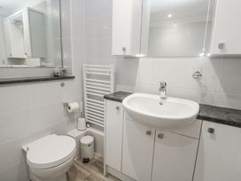 A bathroom with a sink and toilet at Golva, Carbis Bay