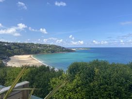 A view of a beach and ocean at Island View in Carbis Bay