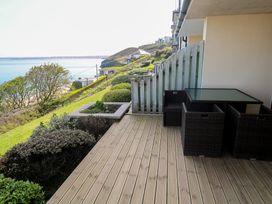 An outdoor area with furniture and plants at Sapphire in Carbis Bay