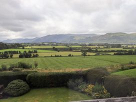 A view of hills and fields from a property at Squirrel Cottage in Bassenthwaite