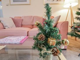 A small Christmas tree with decorations on a table at Weydale Avenue in Scarborough