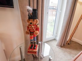 A decorative figure on a glass table in the living room at Weydale Avenue, Scarborough