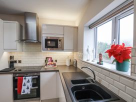 A kitchen with appliances and decorations at Weydale Avenue in Scarborough