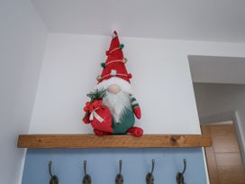 A gnome on a shelf in an entryway at Weydale Avenue, Scarborough