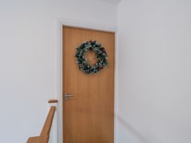 An entryway with a door and a wreath at Weydale Avenue in Scarborough