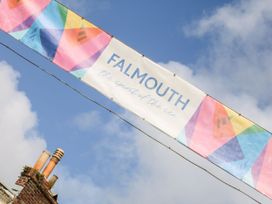 A banner displaying Falmouth the spirit of the sea outdoors at Dragonflies & Seahorses in Falmouth