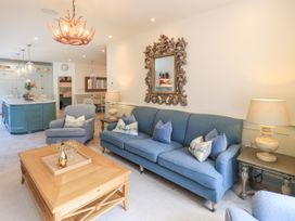 A living room with a sofa and coffee table at Fern Bank in Penrith