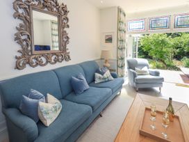 A living room with a sofa and a coffee table at Fern Bank in Penrith