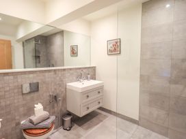 A bathroom with a sink and shower at Fern Bank in Penrith