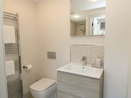 A bathroom with a sink and toilet at 12 Manor Farm Close in Kingham