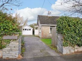 A house with a garage and pathway at Avoca in Rock