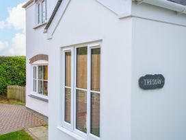 An exterior view of a house with a sign stating Tresow at Tresow in Rock