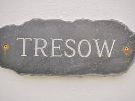A sign reading Tresow mounted on a wall at Tresow in Rock