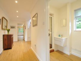 A bathroom with a sink and shower at Tregillan in Rock