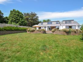 A house with a garden and trees at Porthilly Brook in Rock