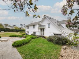 A house with a garden and stone pathway at Cherrytrees in Rock