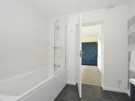 A bathroom with a bathtub and shower at Corriana in Rock
