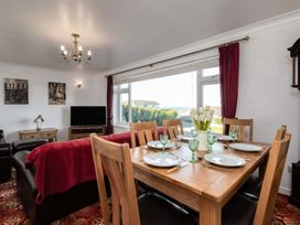 A dining room with a table set for dinner at Hillview Polzeath