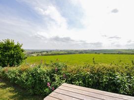A view of green fields and flowers at Hillcroft Bungalow Daymer Bay