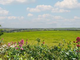 A view of fields and flowers at Hillcroft Bungalow in Daymer Bay