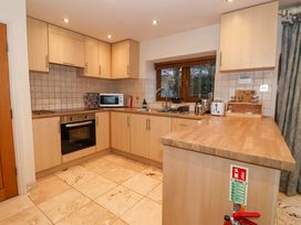 A kitchen with cabinets and appliances at Brush and Boot in York
