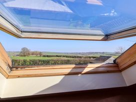 A skylight view of hills and trees at Brush and Boot in Stittenham near York