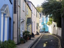 A street with colorful houses and a road in Dartmouth