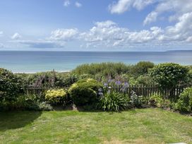 A view of the ocean and garden at Stonecroft in Praa Sands