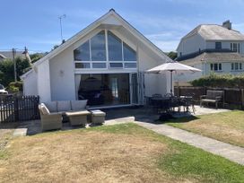 A garden with seating and table at Awel Deg, Newport