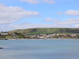 A coastal view with hills and houses at The Barn in Lytchett Matravers